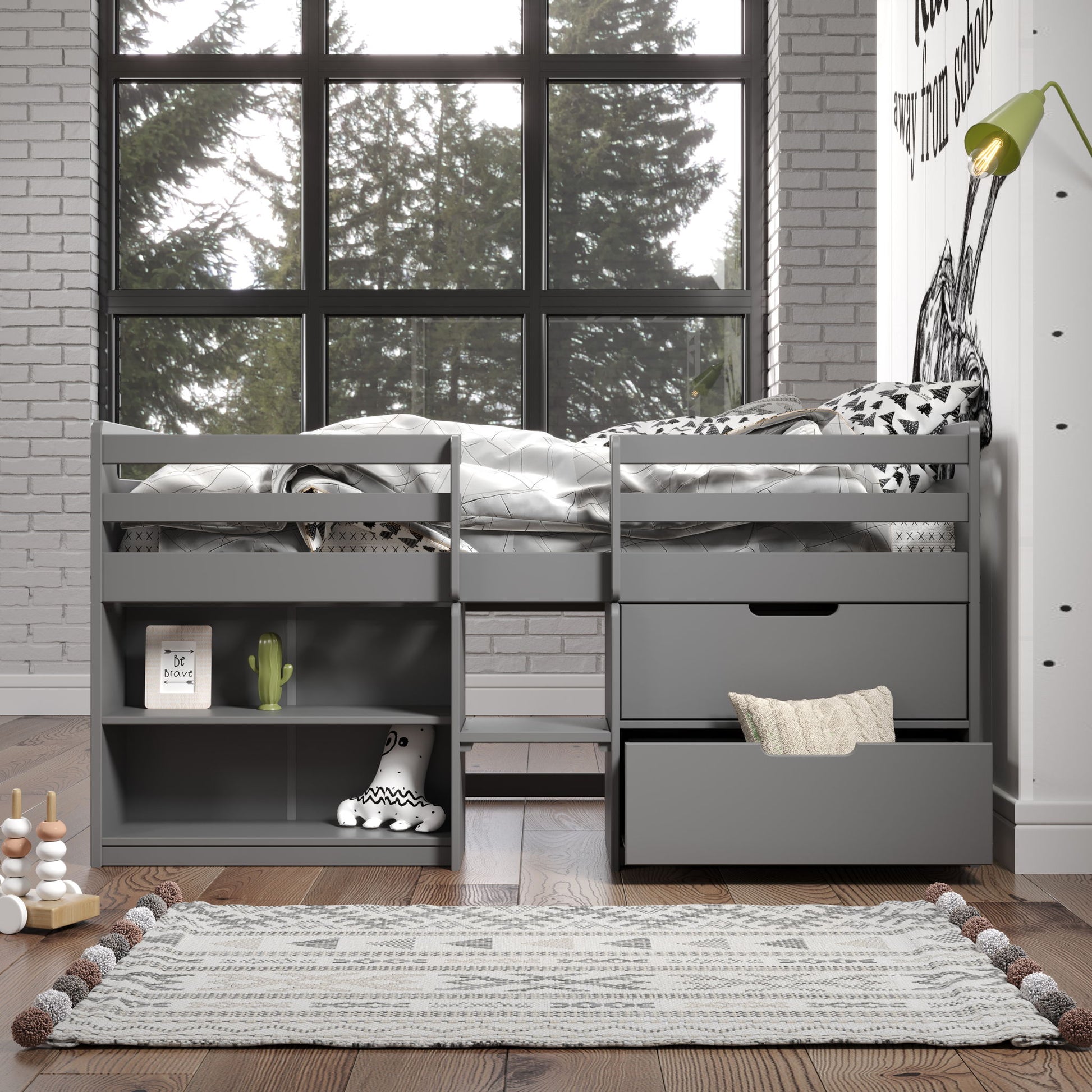 The Fabiana Twin Loft Bed With Storage in gray features built-in shelves and drawers, arranged in a bright room with a large window, wood floor, and patterned rug. Toys, books, and decor are neatly displayed on the shelves.
