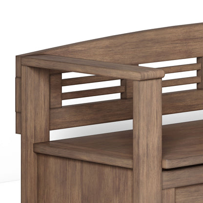 Close-up of the Adams Entryway Storage Bench in Rustic Natural Aged Brown, featuring a curved backrest and armrest with horizontal slats and a smooth wood grain finish. The design is simple and modern.