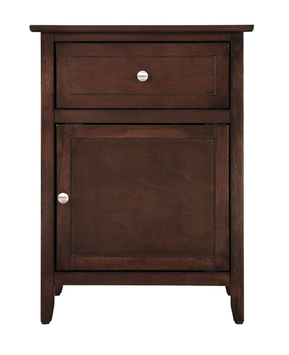 The Izzy 1 Drawer/1 Door Nightstand is crafted from wood with a dark brown finish and features a top drawer and lower cabinet, both accented with matching round metal knobs.
