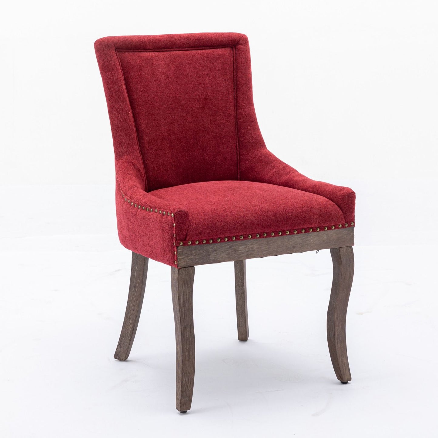 A set of two Ultra Side Dining Chairs with thickened fabric upholstery, neutrally toned solid wood legs, and bronze nailhead trim, shown against a plain white background.