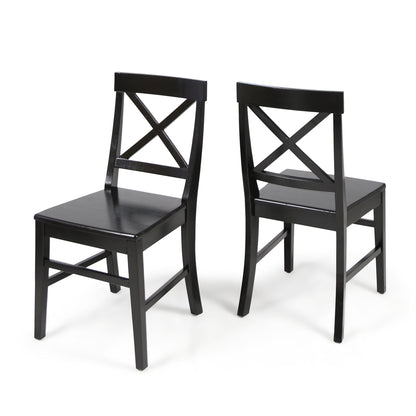 The Plethora Dining Chair With X Shaped Back (Set of 2) includes two black wooden chairs—one front-facing, one showing the back—with X-shaped backrests, straight legs, and flat seats, displayed against a white background.