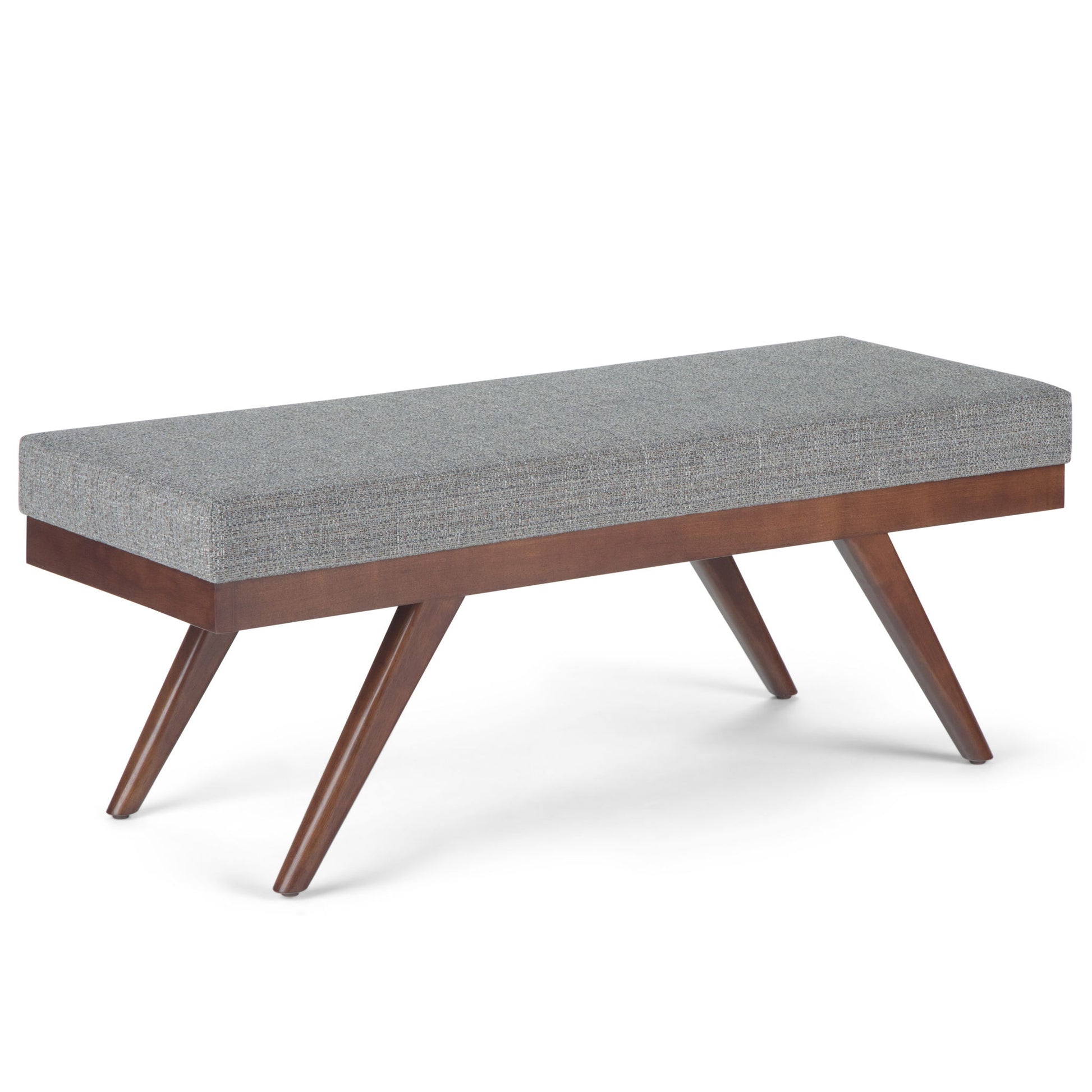 The Chanelle - Mid-Century Ottoman Bench features a rectangular gray upholstered seat and angled wooden legs, showcasing a modern mid-century design.