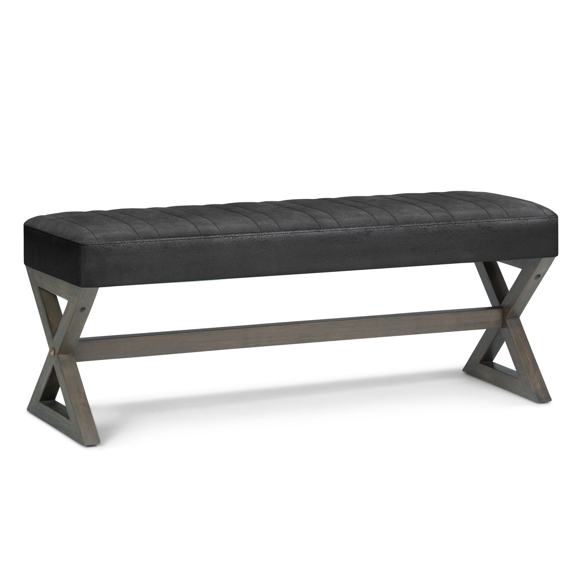 The Salinger - Large Upholstered Ottoman Bench features a black cushioned seat and wooden X-shaped legs in a simple, contemporary design.