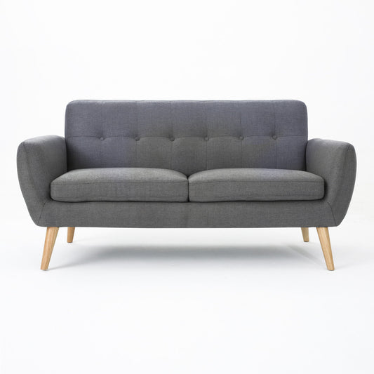 The Modern Loveseat Sofa With Button Tufted Backrest features gray fabric upholstery, a tufted backrest, curved armrests, and angled wooden legs, displayed against a plain white background.