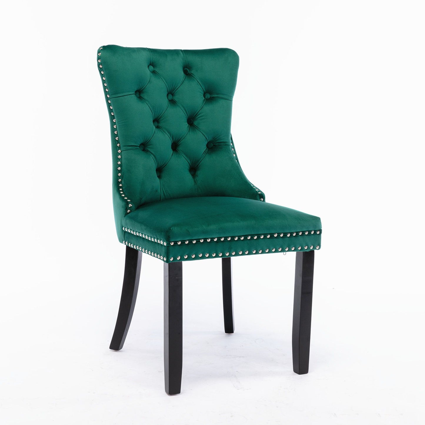 The Nikki set includes two modern, high-end tufted green velvet dining chairs with solid wood legs and silver nailhead trim, displayed against a plain white background.