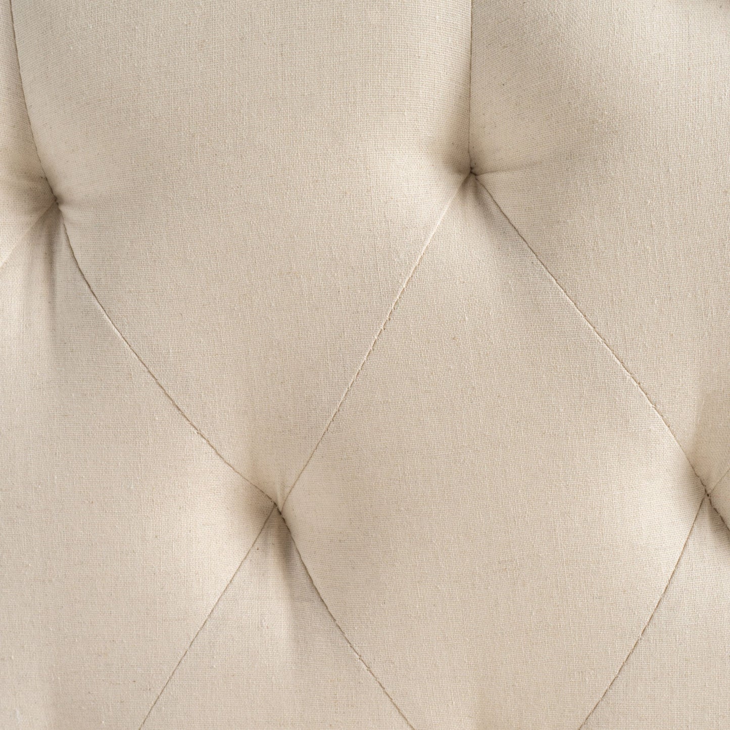 Close-up of the Queen & Full Size Headboard in beige, featuring soft upholstered fabric with diamond tufting, button details, neat stitching, and elegant nailhead trim.