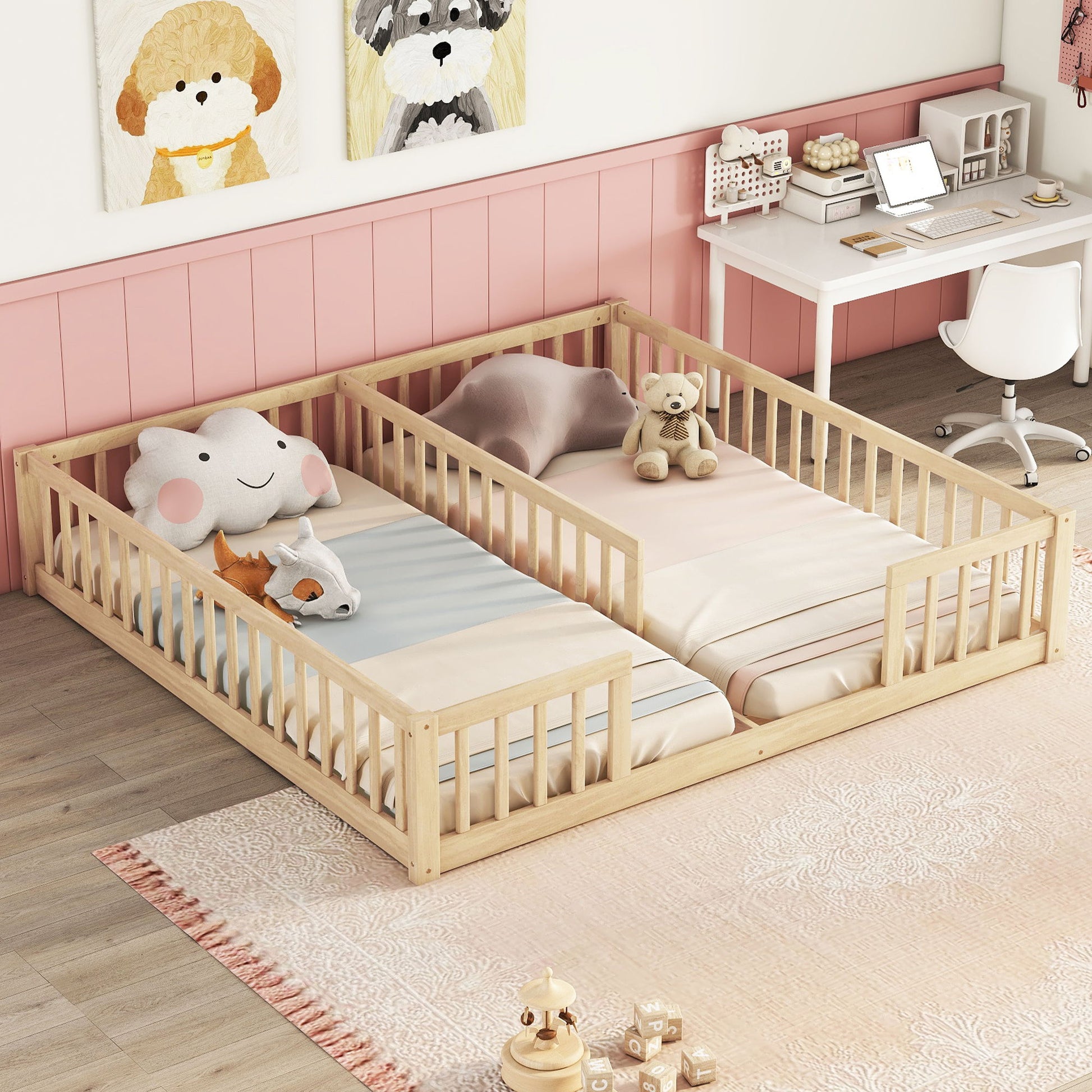 A cozy children's bedroom features a Double Floor Bed With Fence, Guardrails, Without Door, each bed with stuffed animals, a pink rug, a desk with chair and computer, and animal art above pink wainscoting.