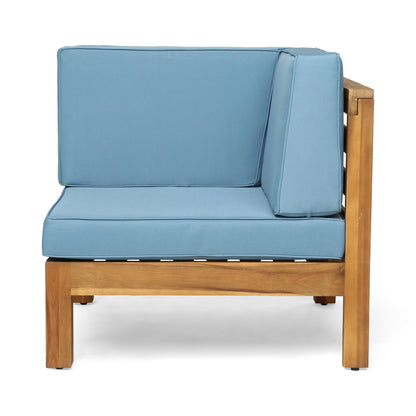 The Oana 2 Piece Loveseat Set features a wooden frame and thick, light blue water-resistant seat and back cushions, shown against a white background.