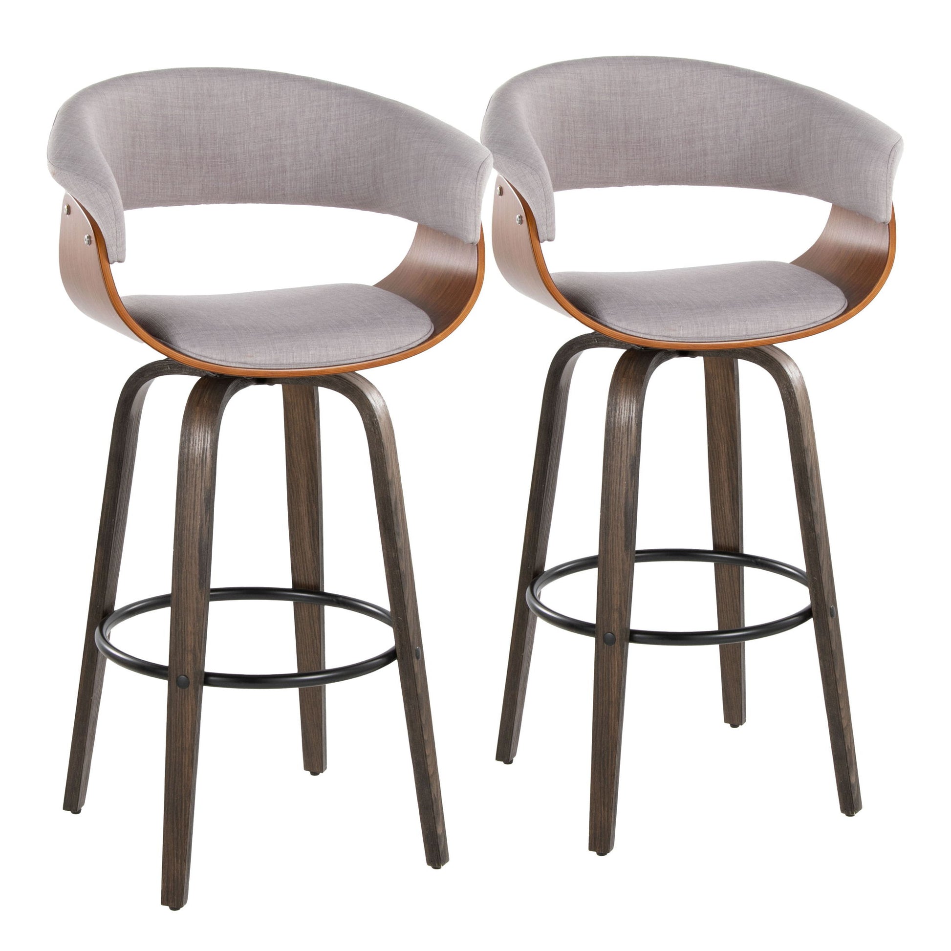 Set of 2 Vintage Mod Mid Century Modern barstools feature curved wooden backs, light gray upholstered seats and backs, dark wood legs, and black metal round footrests, shown against a plain white background.