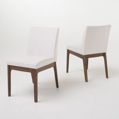 A pair of Contemporary Fabric Comfort Dining Chairs (Set of 2) with light beige upholstered seats and backs, supported by dark wooden frames, are displayed on a plain white background—one faces forward, the other backward.