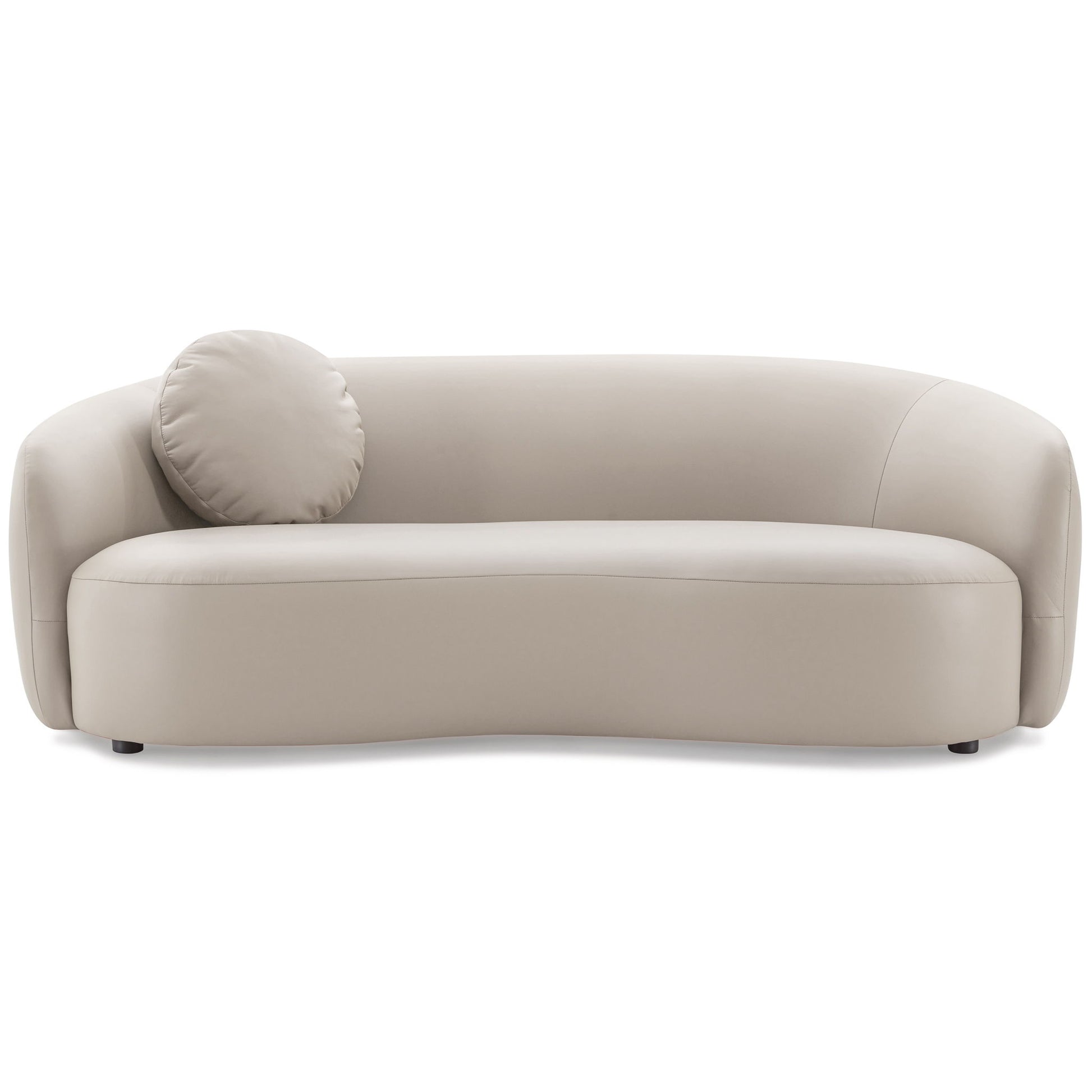 The Porter - Comfortable Sofa is a modern, light beige curved sofa with smooth upholstery and a single round matching pillow on the left, displayed against a plain white background.