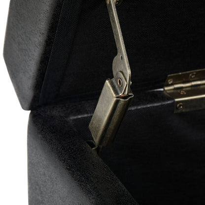 Close-up of the hinge and support arm inside the Avalon - Storage Ottoman Bench in Distressed Black, with the lid partially open to reveal interior and hardware details.
