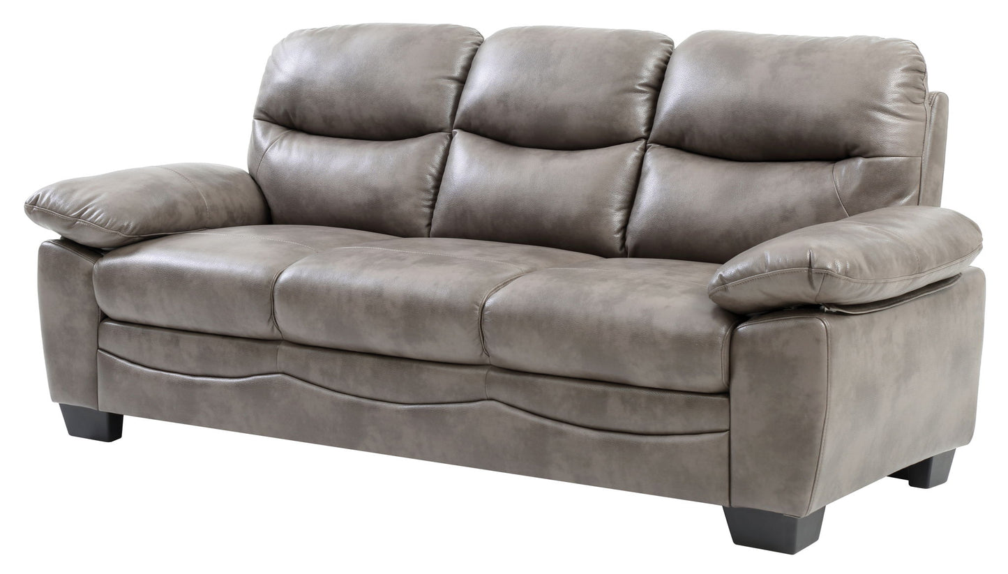 The Marta - Sofa is a three-seater gray leather piece with padded armrests and cushions, modern design, and short black legs.