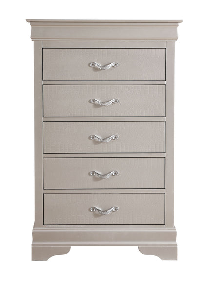 The Lorana Chest is a beige five-drawer dresser featuring silver handles, subtle textured drawer fronts, and short curved legs.