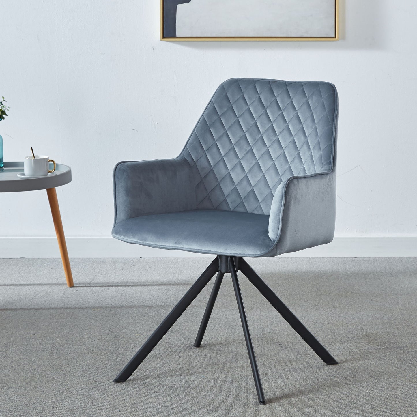The Modern Desk Chair No Wheel is an ergonomic blue upholstered chair with metal legs, perfect for your home office, bedroom, or living room. Its stylish design fits well in minimalist spaces on a light carpet.