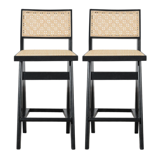 The Keira Bar Stool Set of 2 features black wooden frames, woven rattan backs and seats, straight legs with footrests, and a modern minimalist design.
