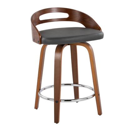 The Cassis Mid Century Modern Fixed Height Counter Stool (Set of 2) features a curved wooden backrest, cushioned dark gray seat, four wooden legs, swivel function, and a round chrome footrest.