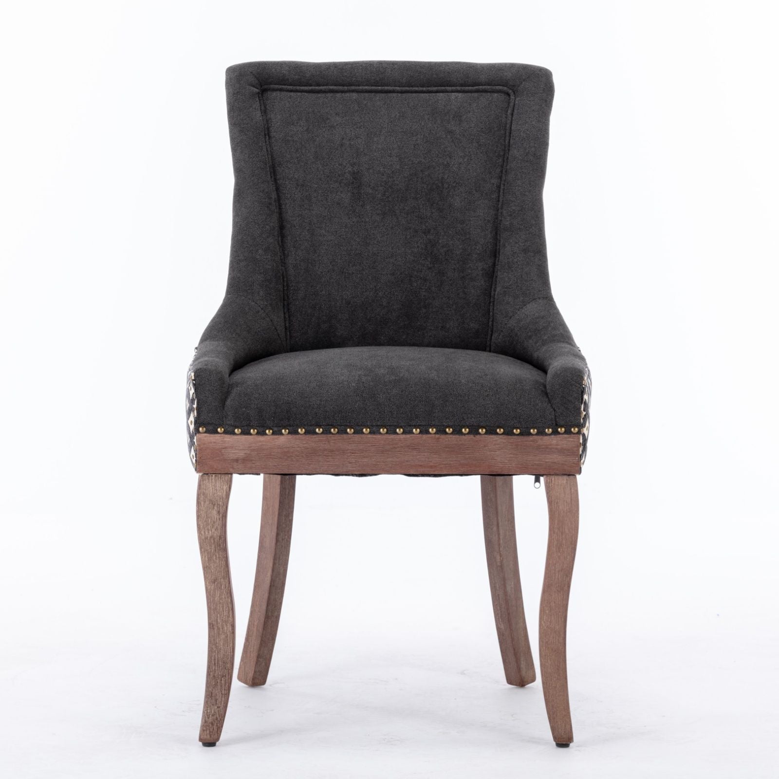 The Ultra Side Dining Chair set features thickened dark gray fabric, a high back, neutrally toned solid wood legs, and bronze nail head trim along the seat edge, displayed against a plain white background.