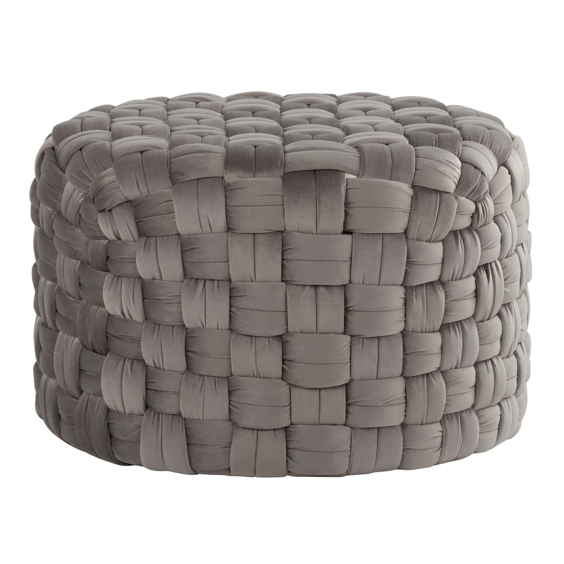 The Braided - Versatile Round Ottoman features a chunky woven design in soft gray fabric, offering a basket-like texture and plush, cushioned look.