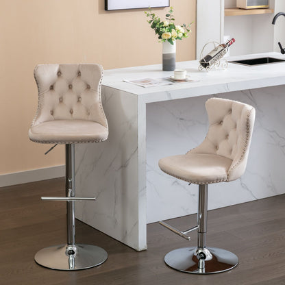 Two Swivel Velvet Barstools with tufted upholstery, adjustable seat heights (25–33"), and chrome bases stand beside a white marble kitchen island adorned with a flower vase and wine rack.