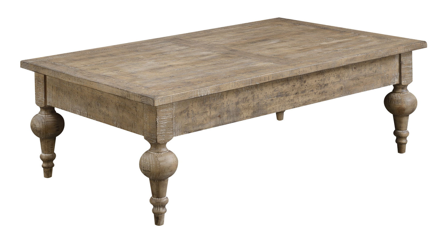 The Ludin Coffee Table in taupe features a rustic rectangular wooden top, four turned legs, and a weathered finish for a vintage look.