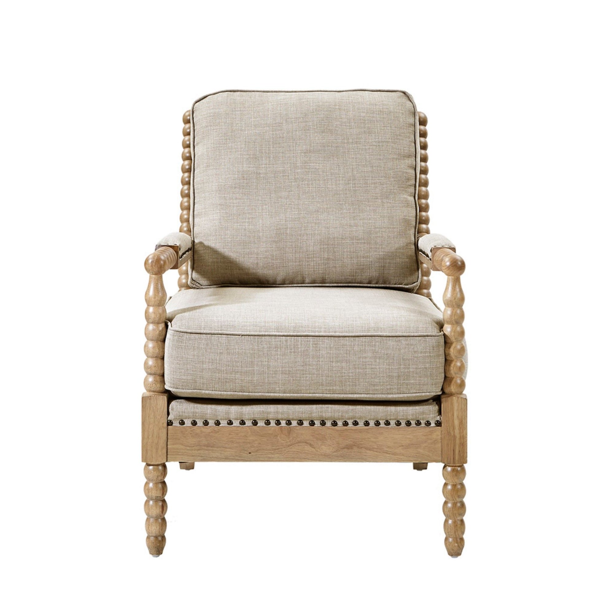 Front view of the Arm Chair With Open Back Spindle Design, featuring padded armrests, beige upholstery, wooden frame, rounded spindle legs and arms, and nailhead trim on the cushion edges, set against a white background.