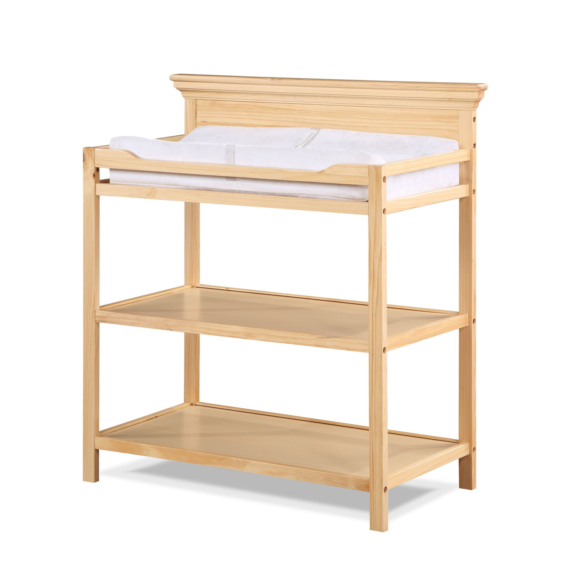 The Universal - Changing Table features a natural wood finish, classic design, two open shelves for storage, and a cushioned changing pad on top—perfect for stylish and convenient diaper changes.