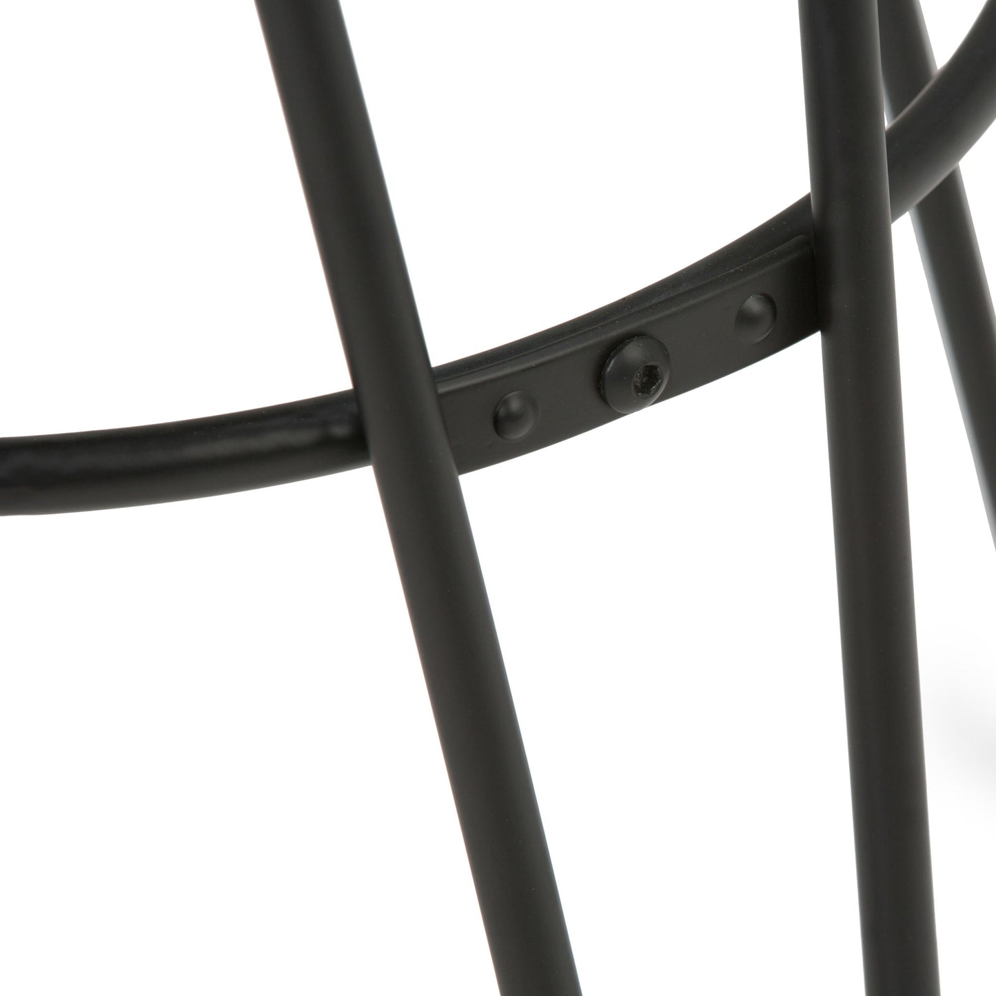Close-up of intersecting black metal rods with a riveted joint, part of the Simeon Multifunctional Metal Stool With Wood Seat, shown against a white background.