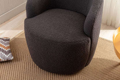 A close-up of the Teddy Fabric Swivel Accent Armchair Barrel Chair with powder-coated metal ring in dark gray, set on a textured beige rug, partially showing a patterned cushion and a nearby yellow object.