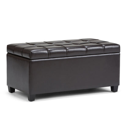 The Sienna Upholstered Storage Ottoman Bench features a rectangular, dark brown leather design with a tufted cushioned top and short legs, offering modern style and versatile use as seating or storage.