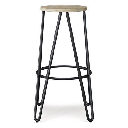 The Simeon Multifunctional Metal Stool features a round light wood seat, black metal legs, a circular footrest, and a sleek, minimalist design.