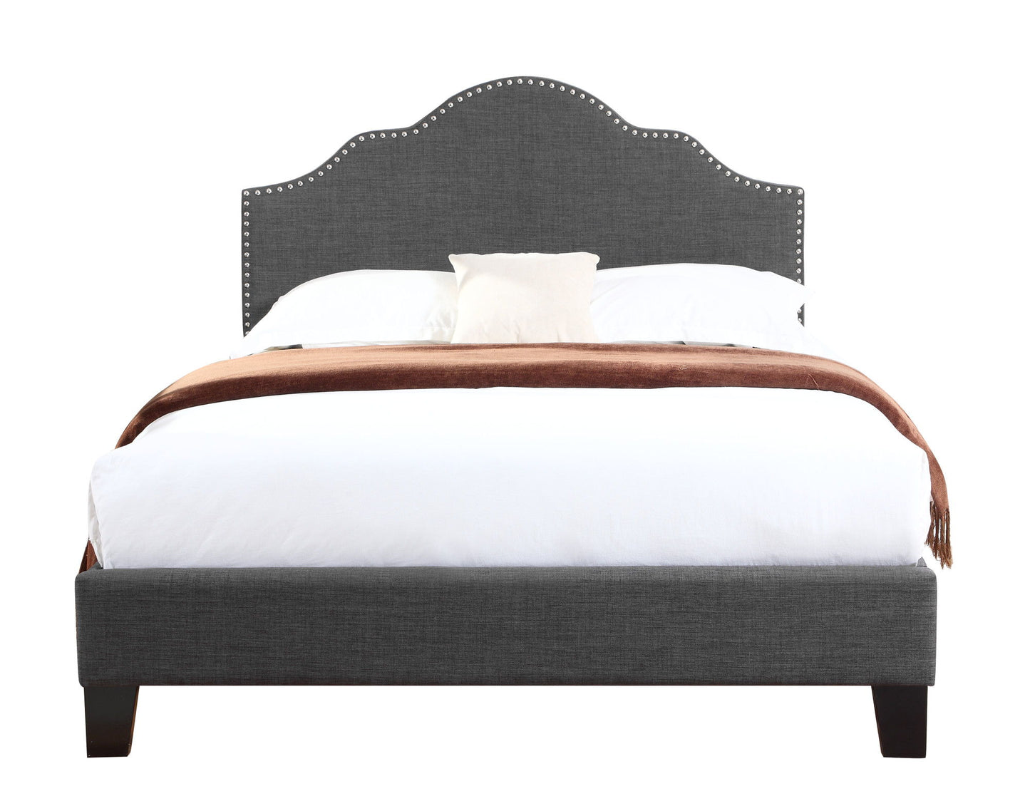 The Kopa - Fabric Upholstered Bed features a gray scalloped, nailhead-trimmed headboard, white bedding, a small white pillow, and a brown throw blanket, displayed from the front against a white background.