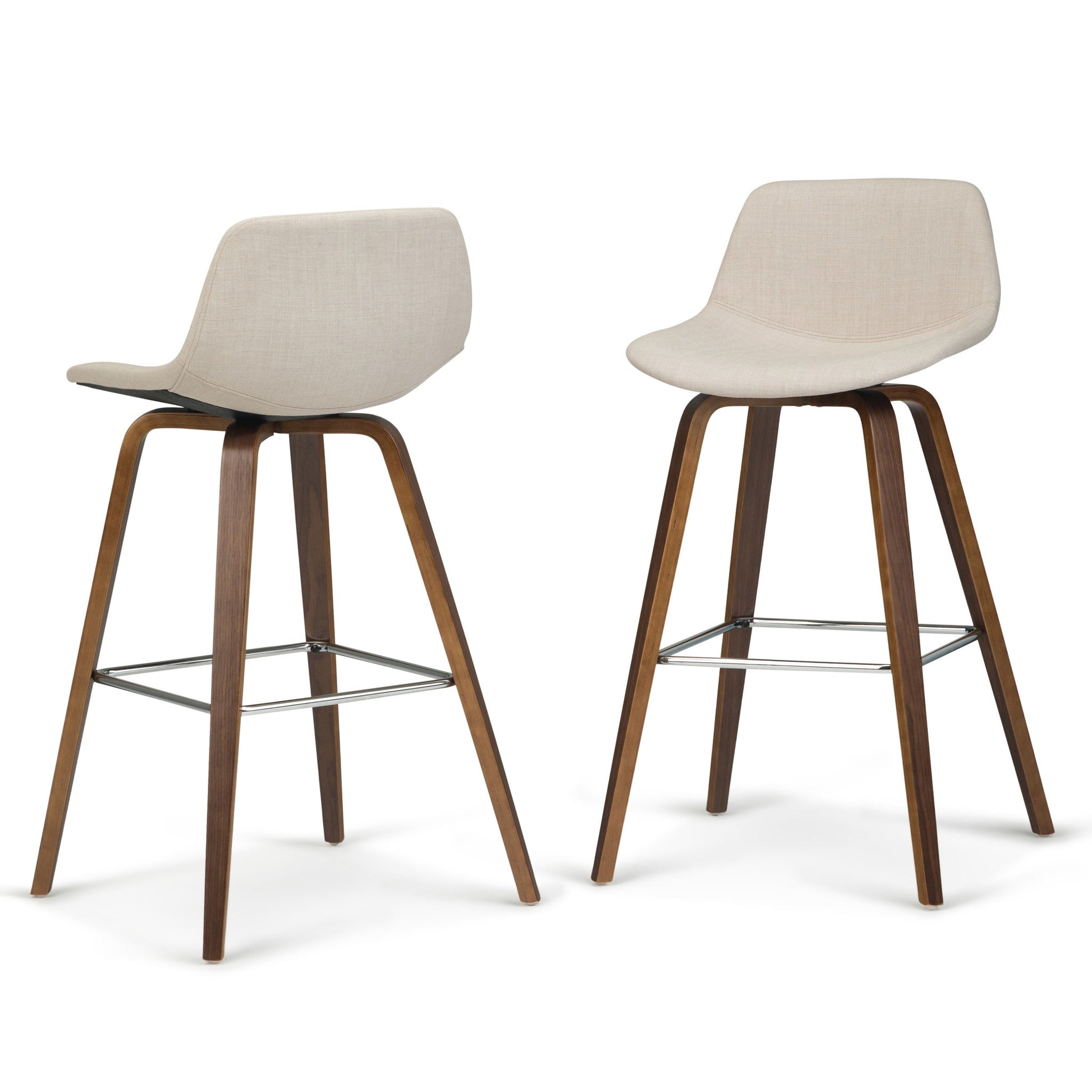 The Randolph Bentwood Counter / Bar Height Stool (Set of 2) features modern bar stools with light beige upholstered seats, curved backrests, angled wooden legs, and a metal footrest for added support.