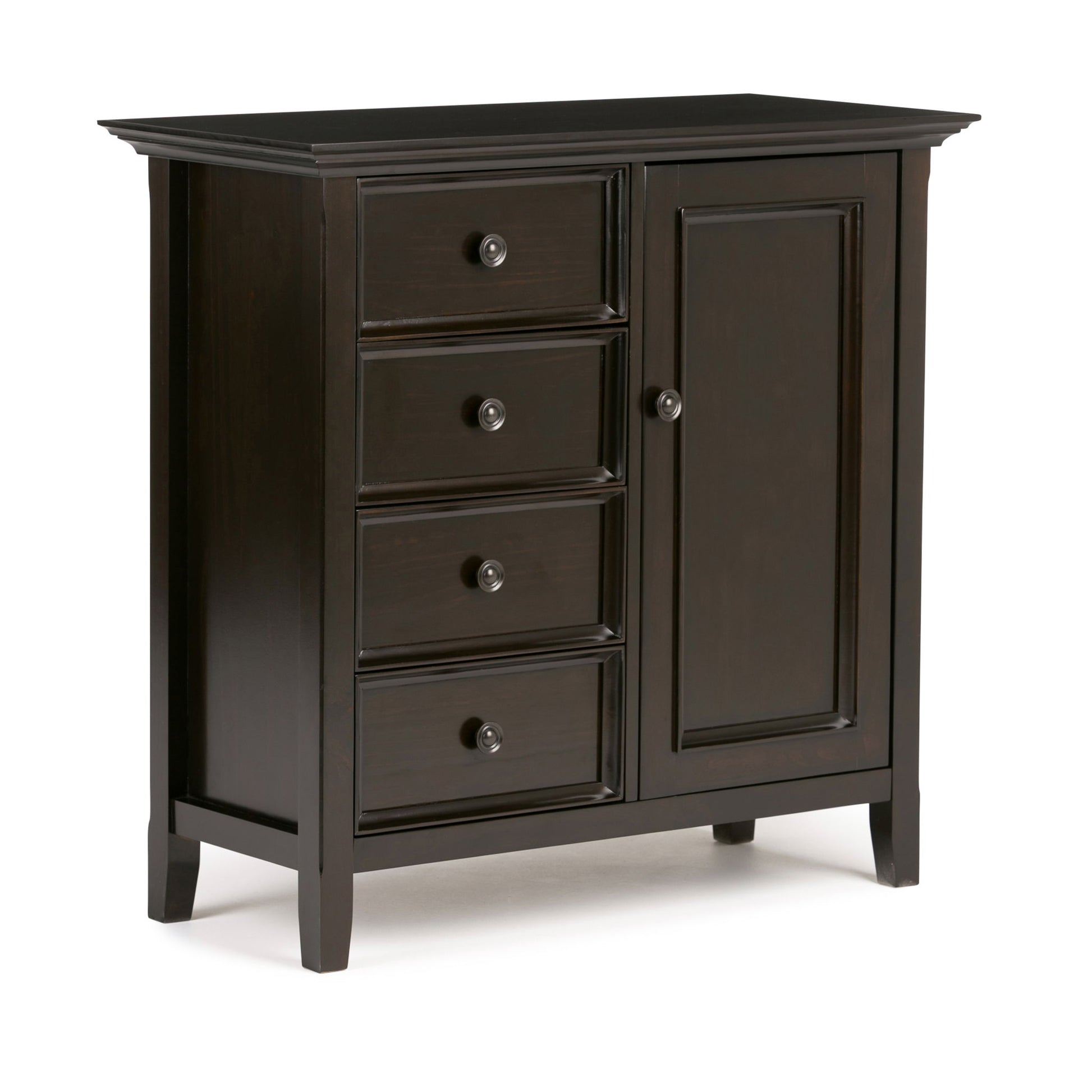 The Amherst - Handcrafted Medium Storage Cabinet is a dark wood piece with four left-side drawers and a right-side door, all with round metal knobs. It stands on short legs and features a simple, classic design.