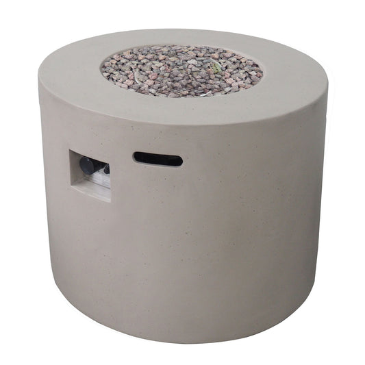 The Round Iron Fire Pit With 40,000 Btu features a modern round design, a top filled with small decorative stones, and a side access panel for easy control.