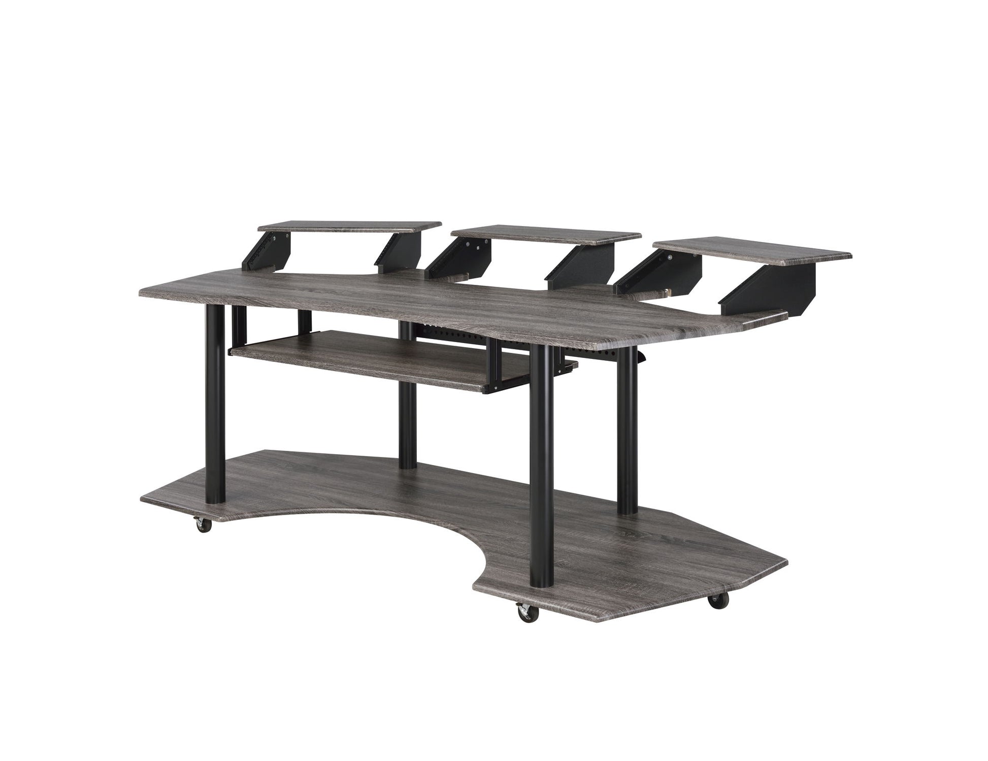 The Eleazar Music Recording Studio Desk features a gray wood finish, curved lower shelf, three raised monitor platforms, sturdy black metal legs, and wheels for easy mobility.