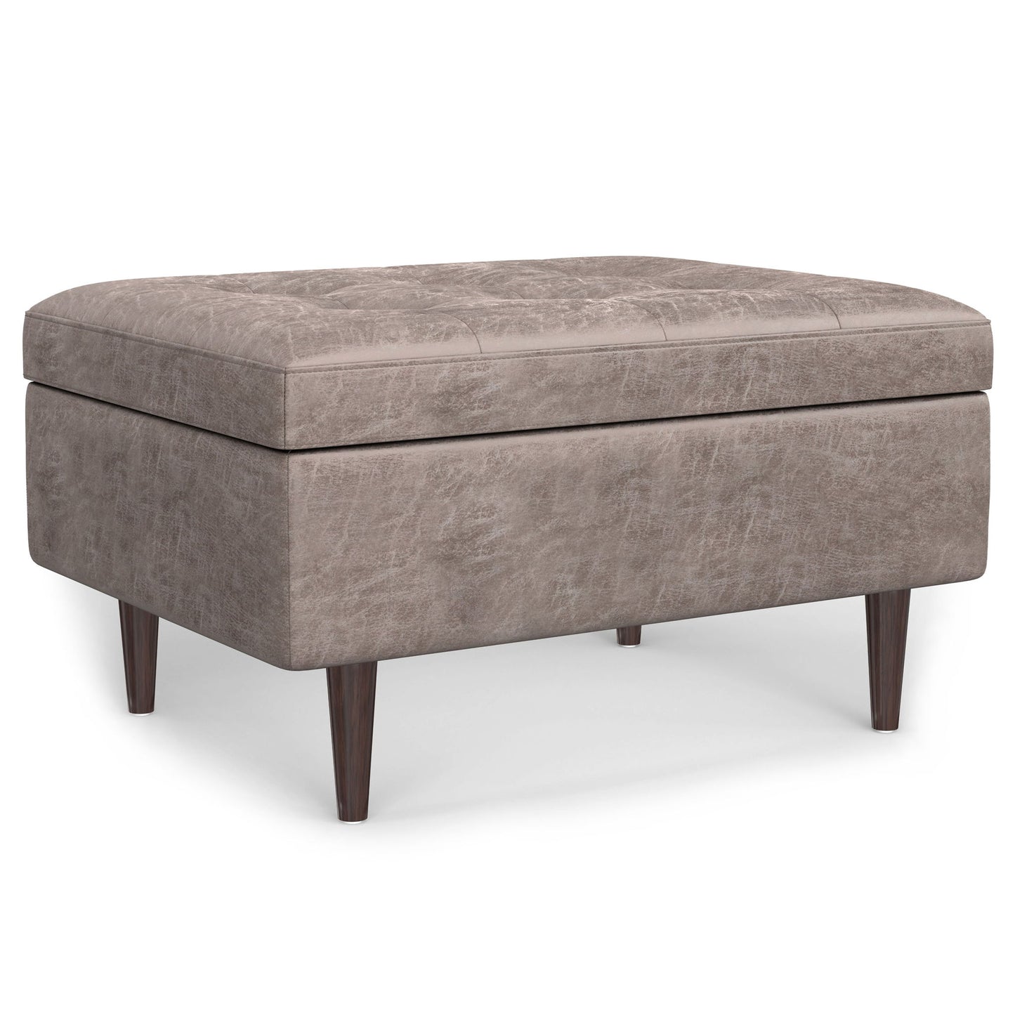 The Shay Large Square Coffee Table Storage Ottoman, mid-century style, features taupe upholstery, a tufted top, and four tapered wooden legs, displayed against a white background.