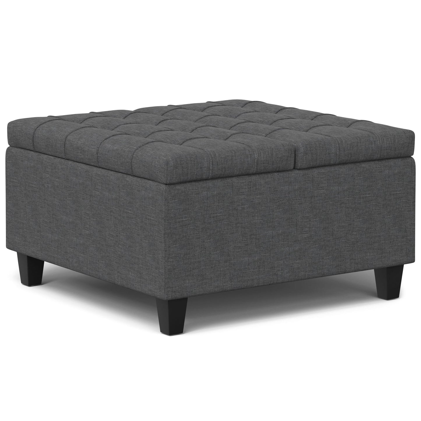 The Harrison Upholstered Coffee Table Storage Ottoman features a square, dark gray tufted top and short black legs.