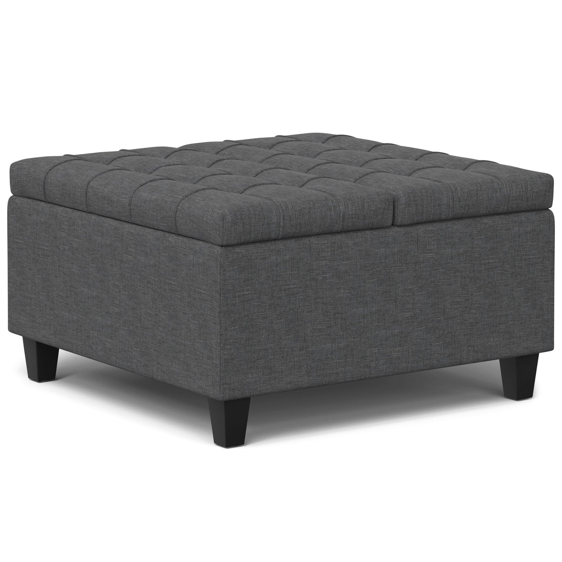 The Harrison Upholstered Coffee Table Storage Ottoman features a square, dark gray tufted top and short black legs.