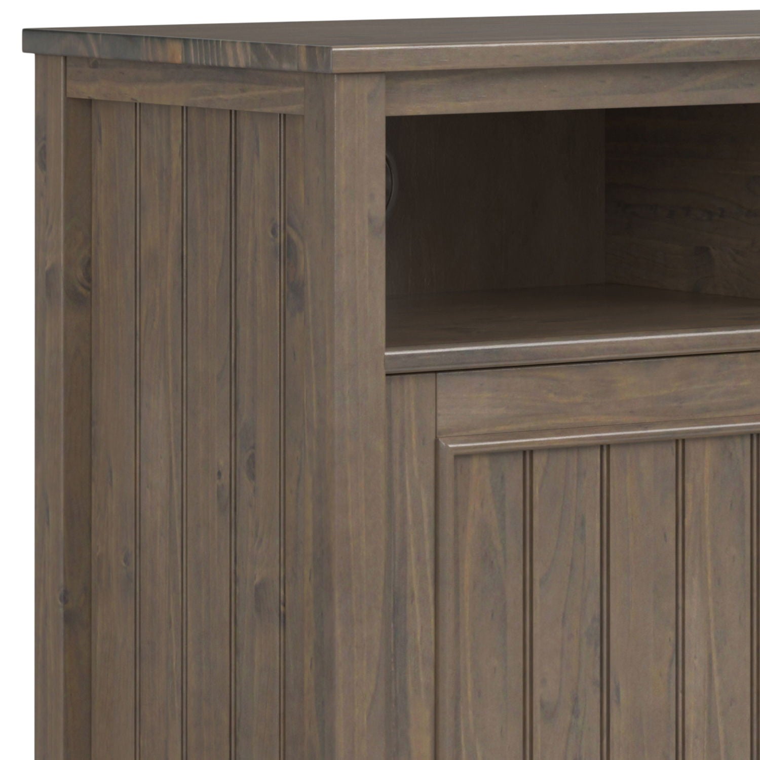 Close-up of the Lev - Medium Storage Cabinet in Smoky Brown, showcasing its rustic wood finish, vertical panel details, and an open shelf above a closed compartment.