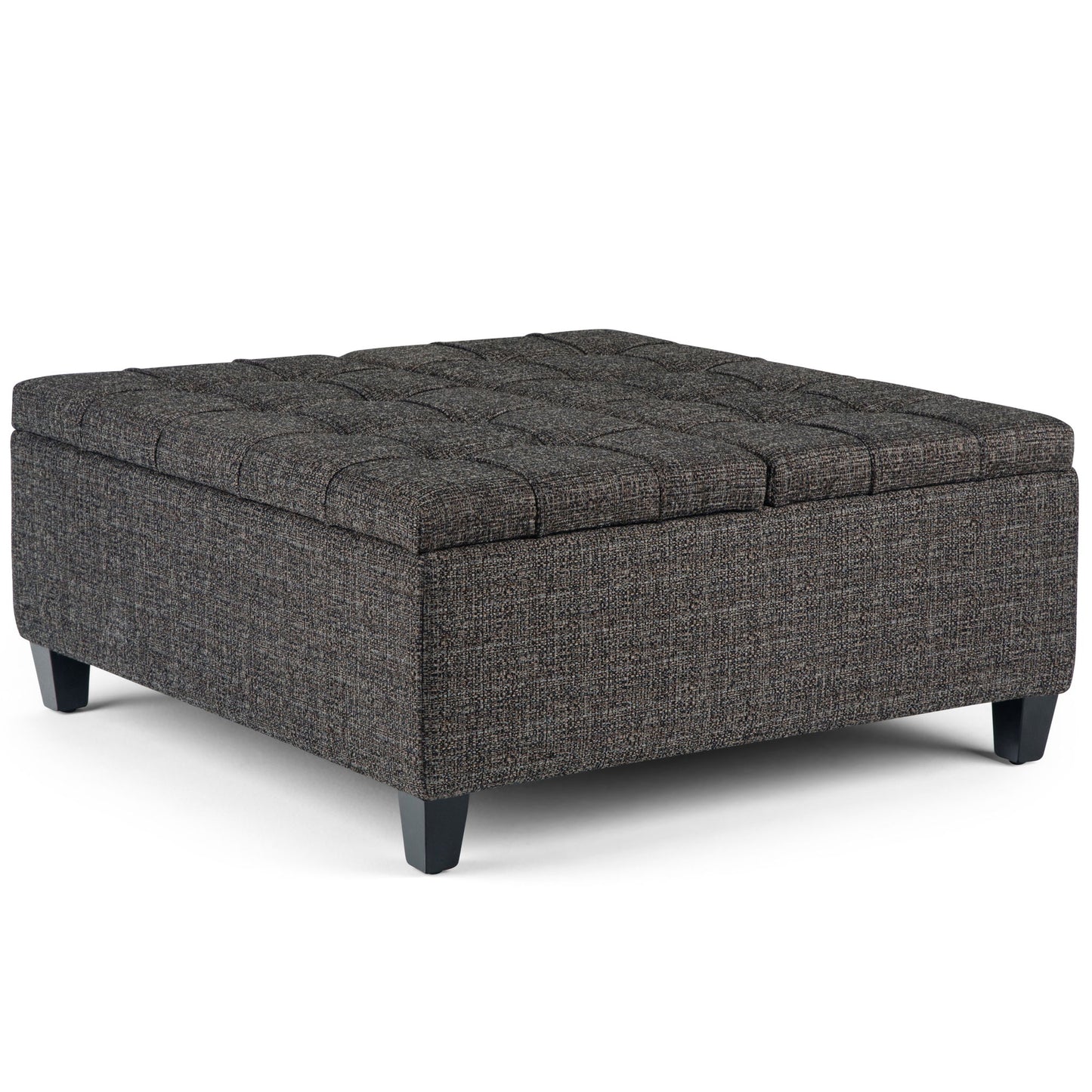 The Harrison Upholstered Coffee Table Storage Ottoman features a square, dark gray tufted top and short black legs, ideal as a coffee table or extra seating.