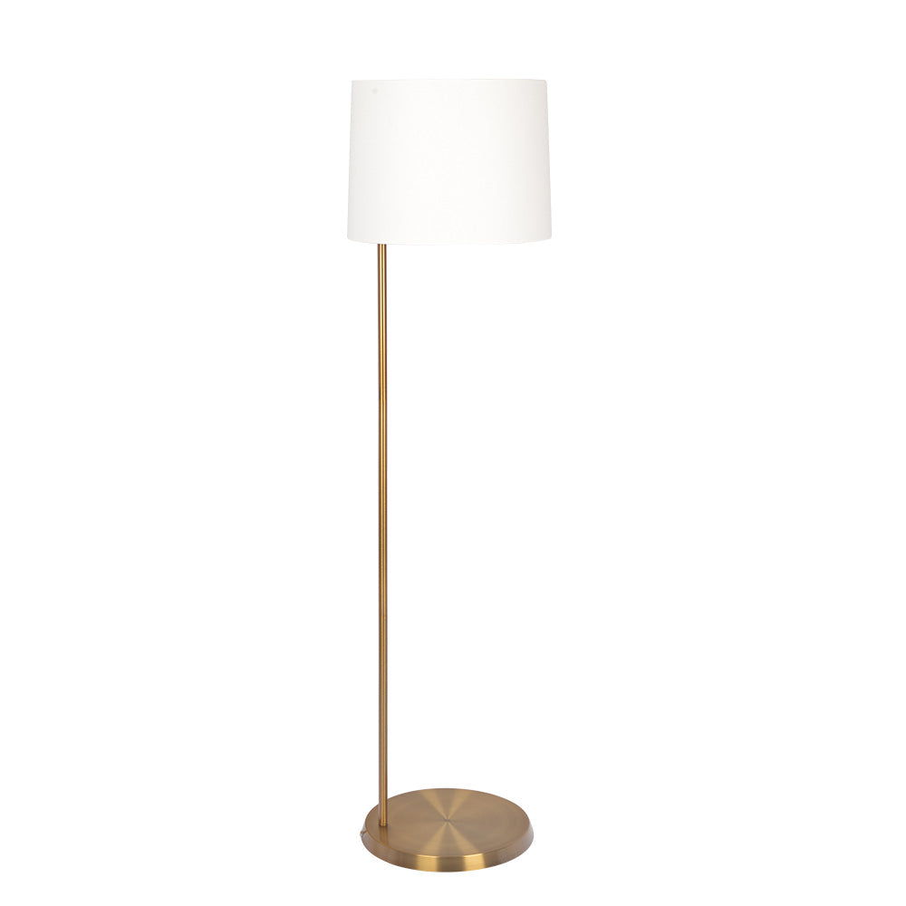 The Zenith Offset Base Floor Lamp features a slim gold metal stand, round base, and a drum-shaped white linen shade for a minimalist, elegant look.