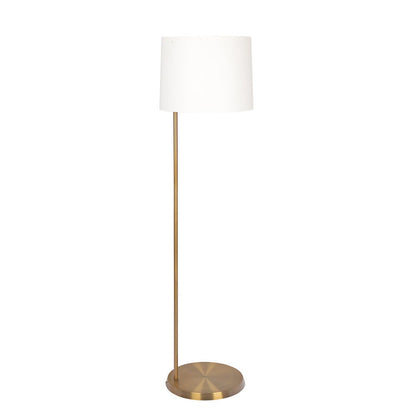 The Zenith Offset Base Floor Lamp features a slim gold metal stand, round base, and a drum-shaped white linen shade for a minimalist, elegant look.