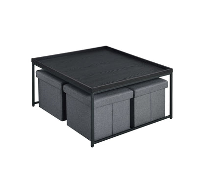 The Vinny Wood Grain Coffee Table Set features a modern black rectangular table with raised edges and four gray cushioned ottomans that store neatly underneath.