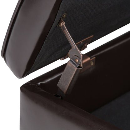 Close-up of the Cosmopolitan - Storage Ottoman Bench With Open Bottom in Tanners Brown, showing its hinged lid partially open and revealing the metal hinge mechanism against a black interior lining.