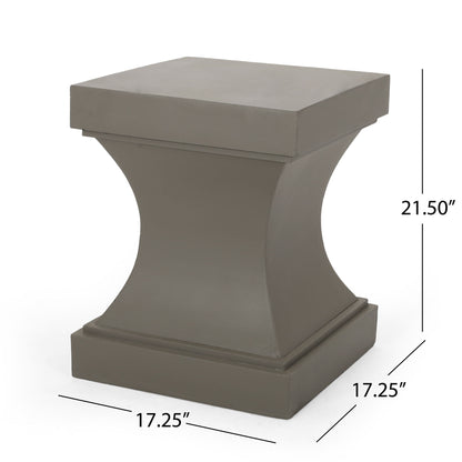 The Athena - Modern Side Table features a gray, square pedestal design with a curved center and flat top, measuring 21.5" H x 17.25" W x 17.25" D. Its simple, modern style offers clean lines for a contemporary look.
