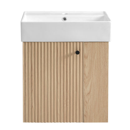 The Modern Floating Bathroom Vanity with Ceramic Basin features a white rectangular sink atop a light wood cabinet with vertical grooves on the left door and a plain right door—ideal for small bathrooms.