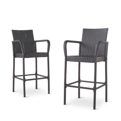 Set of two Outdoor Wicker Barstools with rattan and iron frames, featuring armrests and footrests in a dark brown woven design, shown against a plain white background.