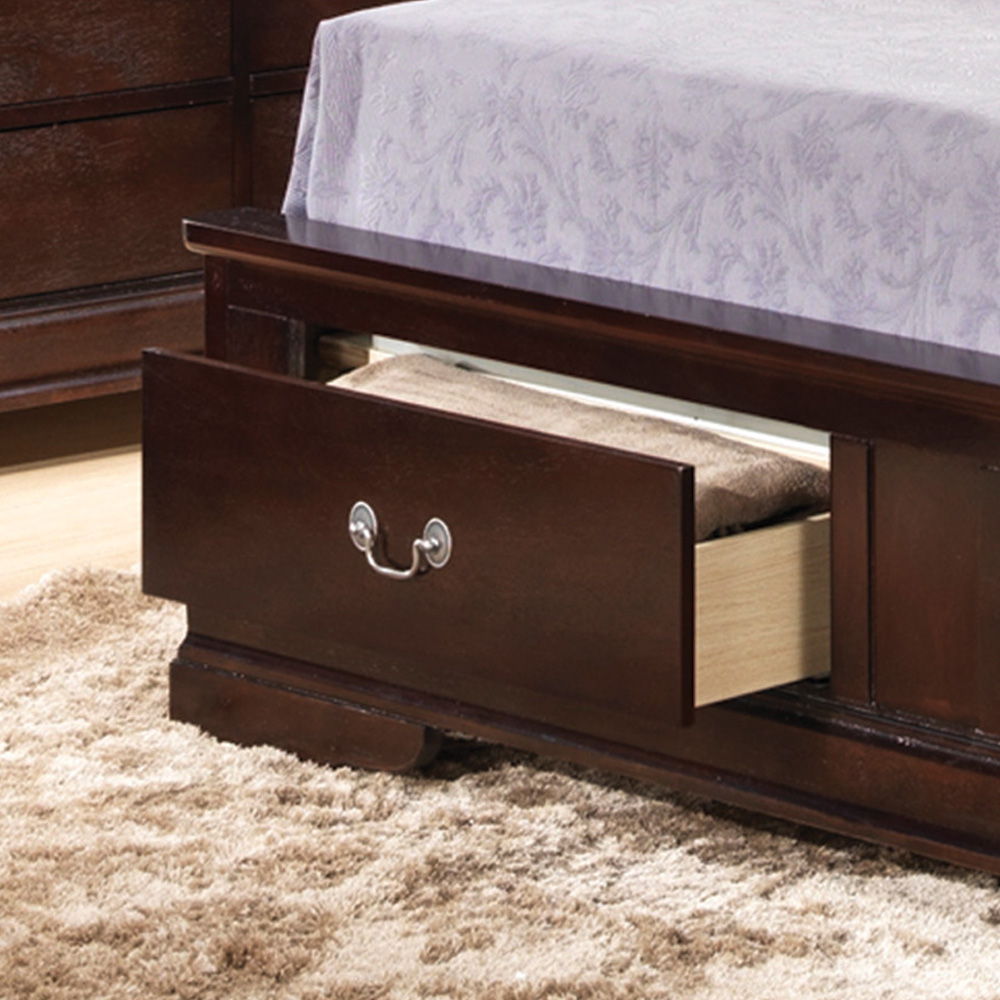 The Louis Phillipe - Storage Bed features a built-in drawer, shown partially open with folded blankets inside. The bed is dressed in a light purple patterned sheet, and a beige shaggy rug covers the floor underneath.
