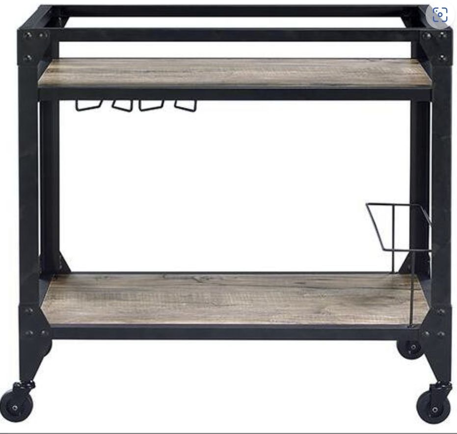The Jorgensen Serving Cart in Rustic Oak/Charcoal features two shelves, wine glass racks, a side bottle holder, and four caster wheels for easy mobility.